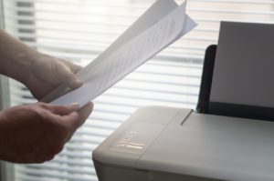 holding paper